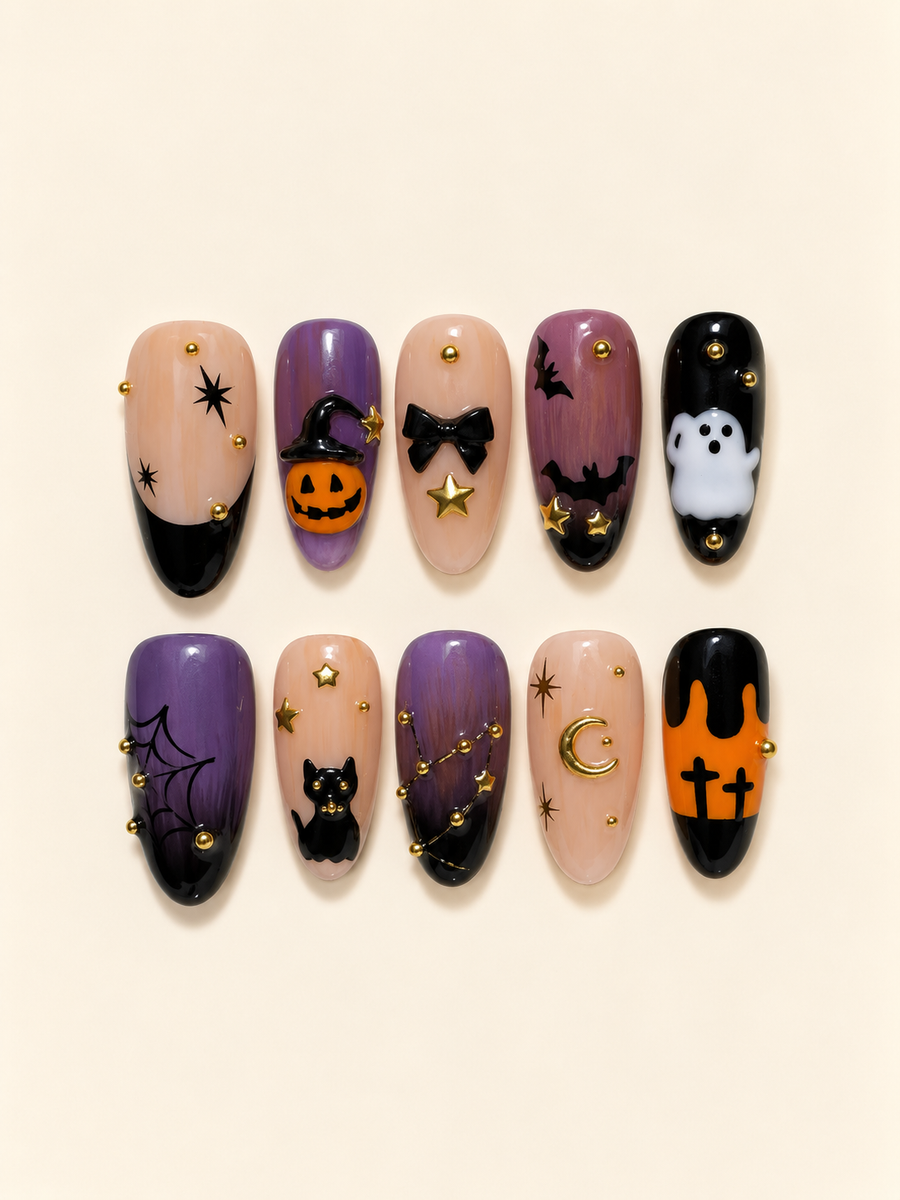 Ten Halloween almond press-on nails in purple, peach, orange, and black with a pumpkin, ghost, black cat, bats, spiderweb, and gold accents